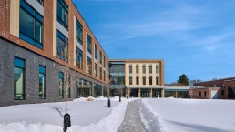 Exterior winter photo showing the new University of New England's Portland, Maine, Health Services Building for future medical professionals