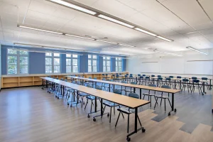 An image of one of the new Yarmouth High School learning rooms. Featuring lots of windows and open seating.