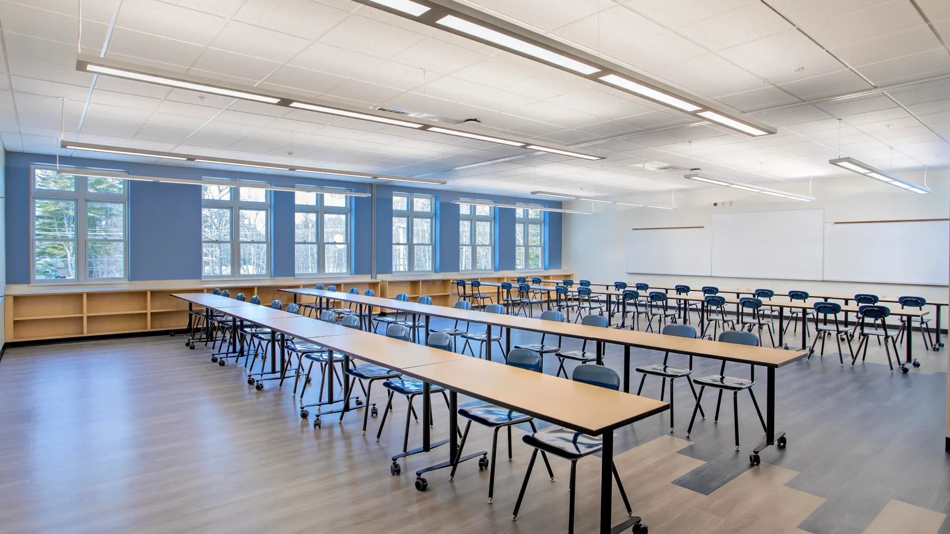 An image of one of the new Yarmouth High School learning rooms. Featuring lots of windows and open seating.