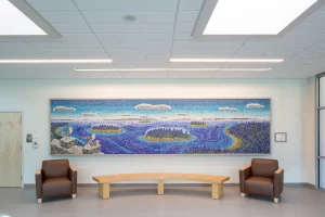A shot of the beautiful mosaic wall art of the bay and ocean in the entry way of the Camden-Rockport Middle School.