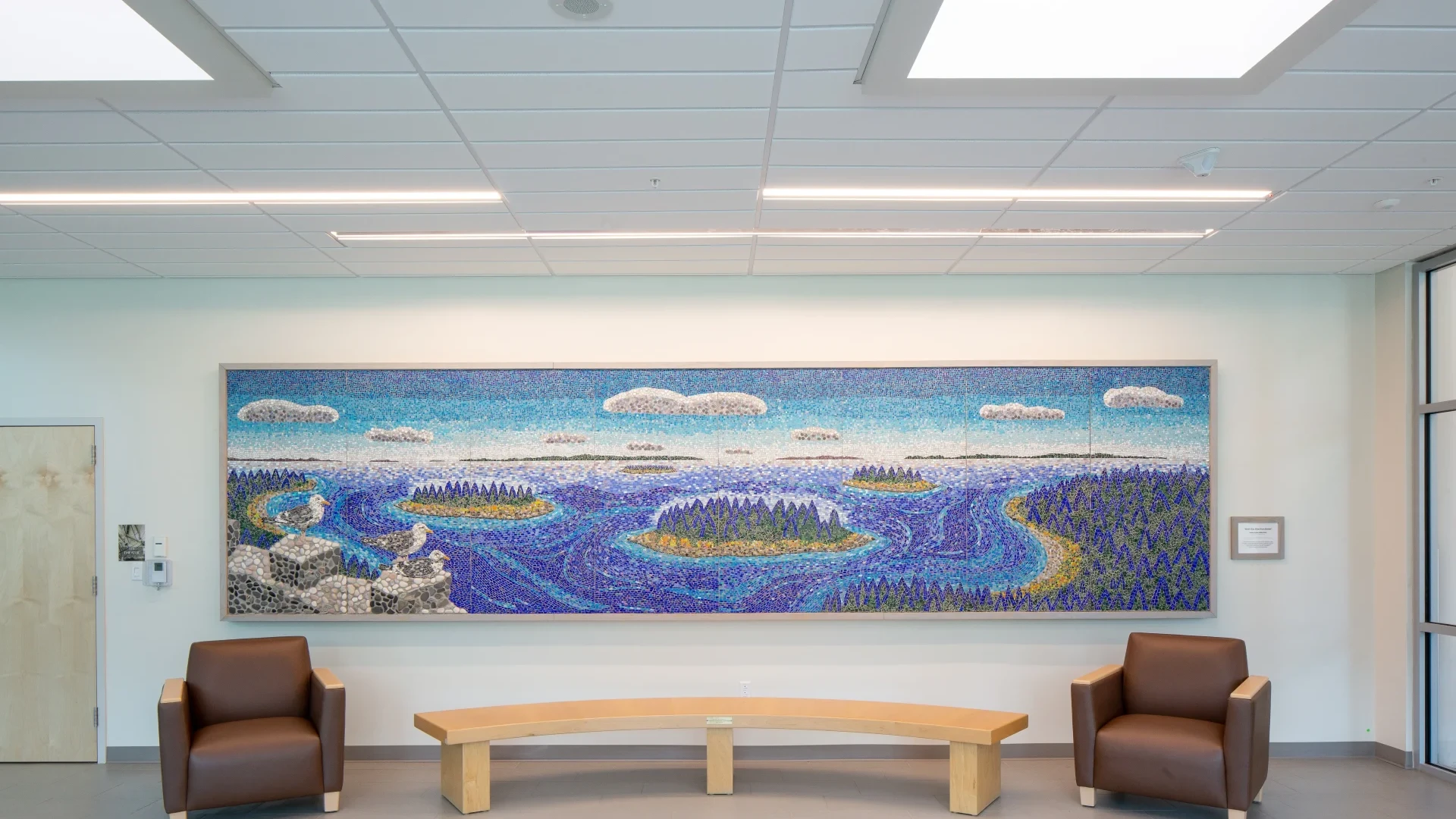 A shot of the beautiful mosaic wall art of the bay and ocean in the entry way of the Camden-Rockport Middle School.