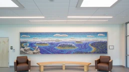 A shot of the beautiful mosaic wall art of the bay and ocean in the entry way of the Camden-Rockport Middle School.