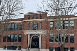 Another photograph of the front of the Mary E. Taylor building in Camden during the winter