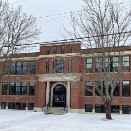Another photograph of the front of the Mary E. Taylor building in Camden during the winter